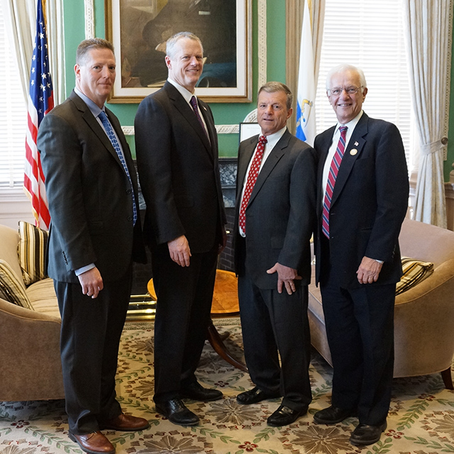 Winthrop Police Chief Terence Delehanty, Governor Baker, Paul E. Flanagan and 
Winthrop Council President Peter Gil