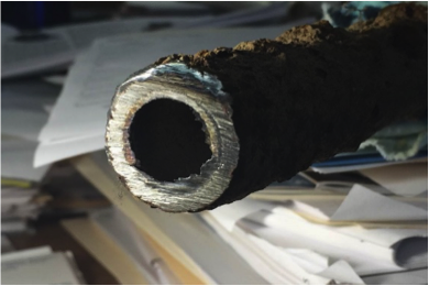 Sample photo of lead-lined steel water service line removed in Quincy 