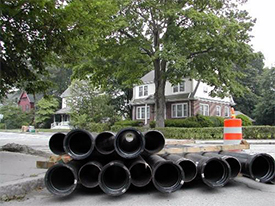 stack of new, cement lined pipe