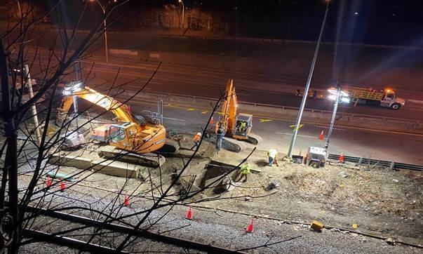 Blow off replacement near MBTA train line, working with state police. 