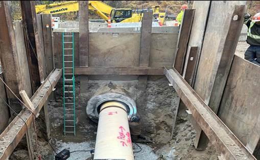 At exit ramp: Slipline new 36-inch pipe inside existing 48-inch pipe