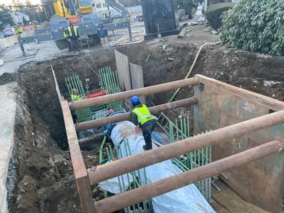 Butterfly valve and thrust collars being installed